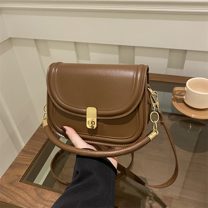 Vintage Fashion Large Capacity Lock 2025 New Indentation Solid Color Commuter Portable Shoulder Crossbody Saddle Bag for Women
