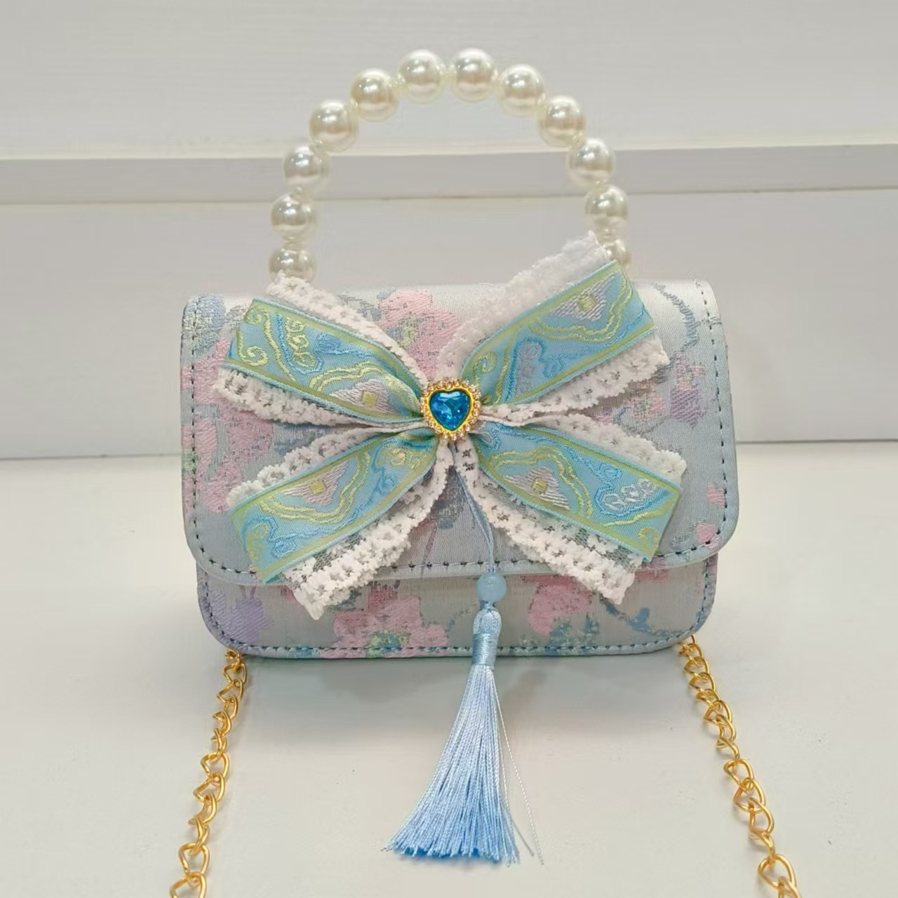 Guofeng arco princesa bolso de perla bolso de hombro bolso de cambio bolso pequeño bolso cuadrado bolso accesorios de ropa de niñas