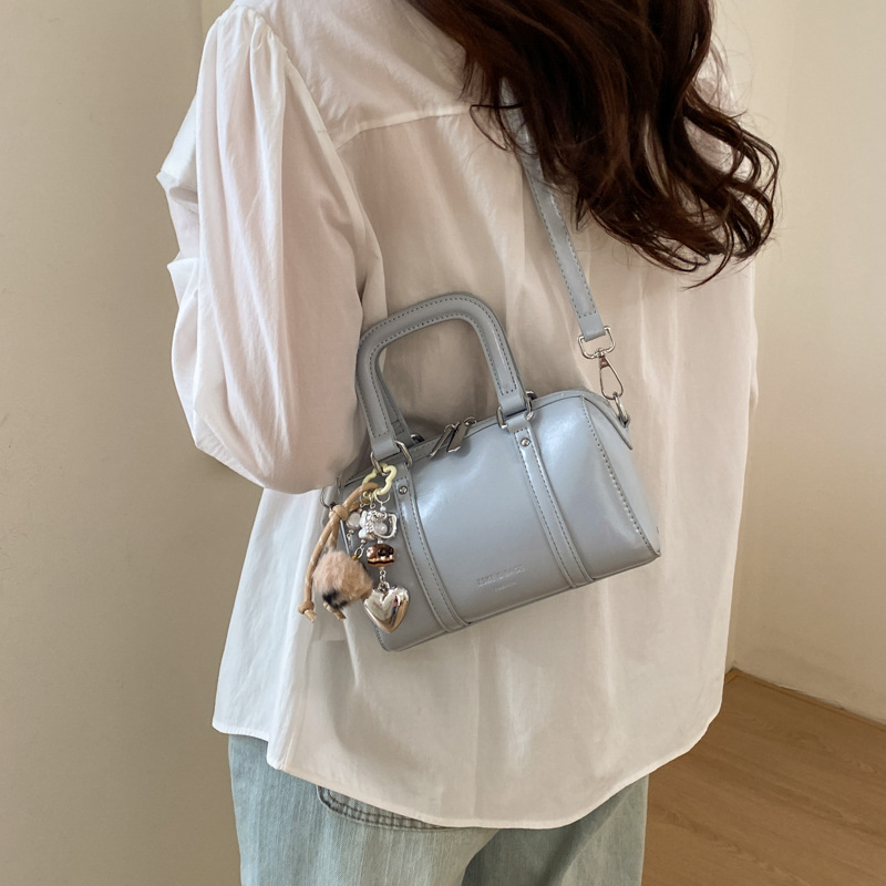 Bolsa de almohada de nicho de textura femenina 2026 nuevo tipo de mochila portátil de moda coreana simple bolso de viaje diario image 4