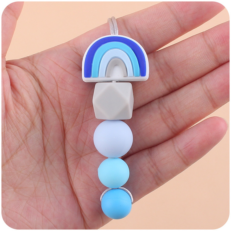 Bebé molar mordedor perlas colgante masticable colgante accesorios de ropa para niños de dibujos animados Arco Iris colgante collar mordedor