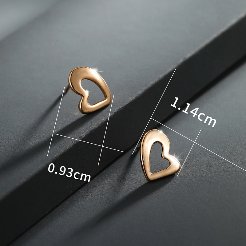 Xupeando joyería de oro pendientes de alto grado temperamento pendientes encantadores nichos femeninos diseño melocotón corazón pendientes joyería de moda