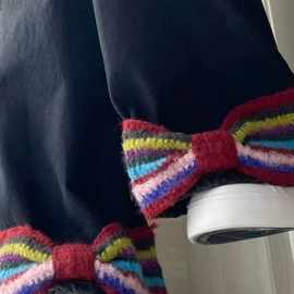 可爱五彩毛绒蝴蝶结设计感直筒牛仔裤女秋冬新款高腰坠感休闲长裤