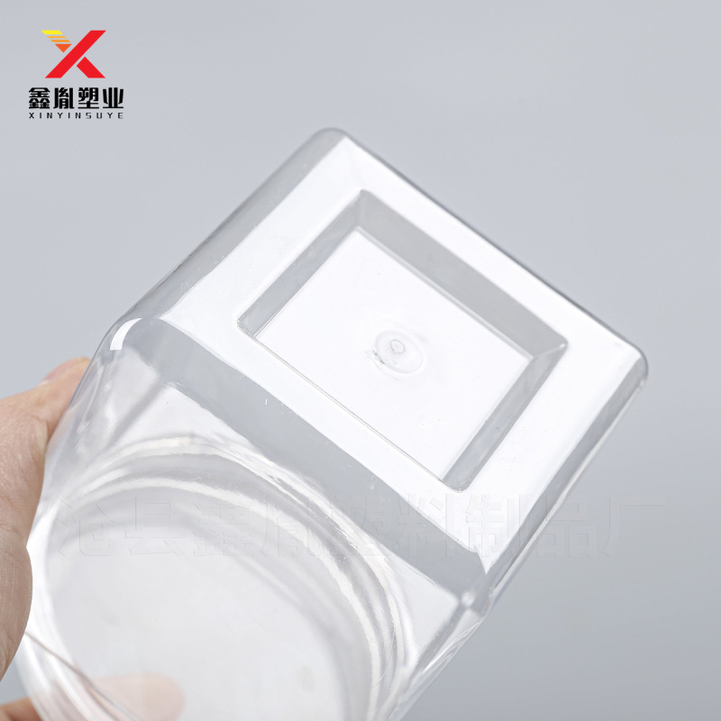 正方形のプラスチック缶 600 ミリリットルアルミ蓋ビスケット包装瓶ペットハンドル付きキャンディボトル 600 グラムナッツプラスチック缶|undefined