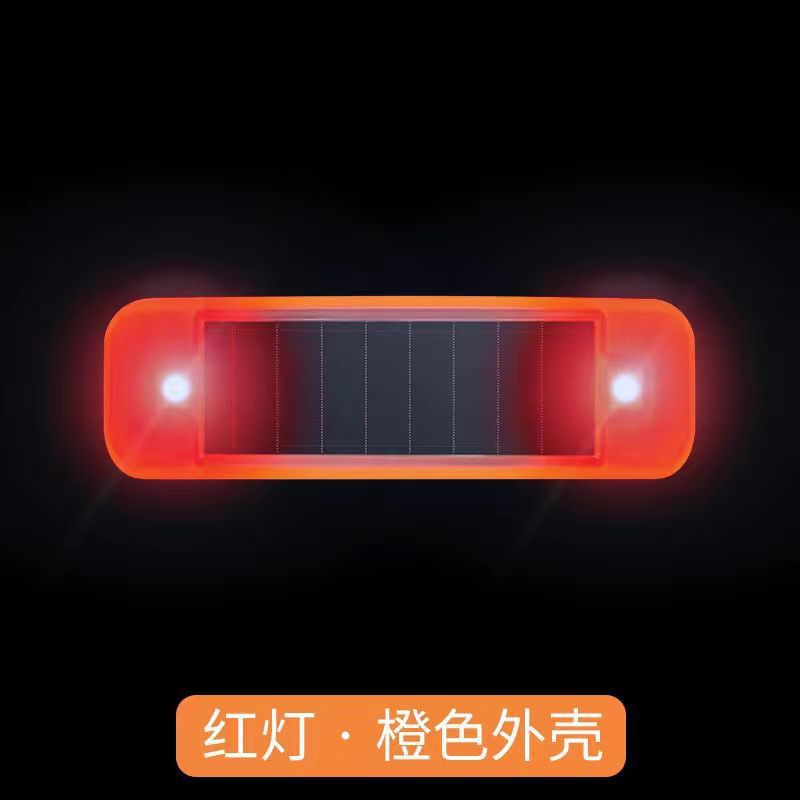 The orange shell automatically turns on when the light is dark - red light