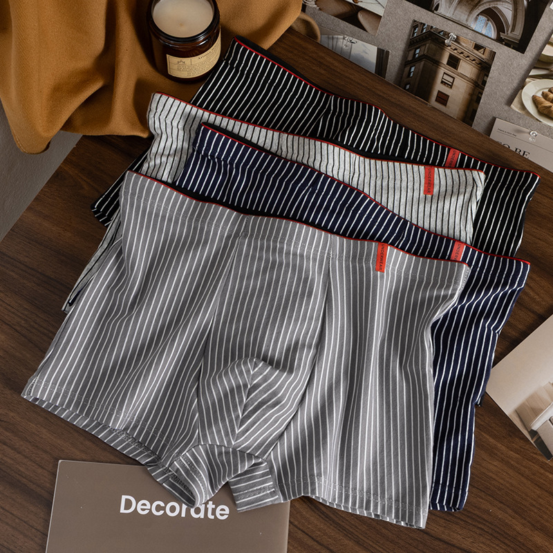 Pantalones de hombre rayadas algodón Xinjiang algodón piel transpirable sueltas grandes al por mayor pantalones de hombre cintura media cómodas