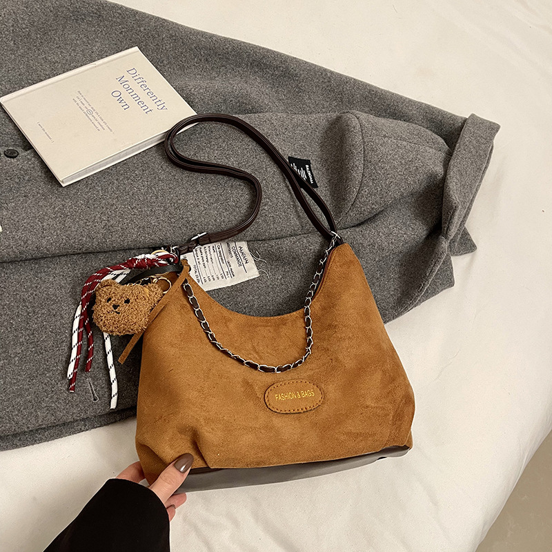 Este año, la moda de moda de peluche de peluche bolso de viaje para mujeres 2024 nueva moda versátil bolso de mochila