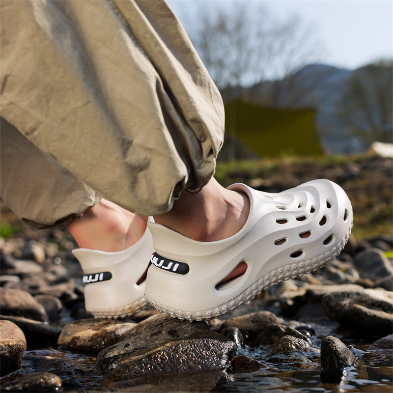 Los fabricantes envían nuevos zapatos con agujeros de verano para hombres eva transpirable, convexo, antideslizante, fuera del hogar, ocio, transfronterizo