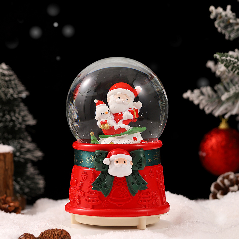 Una variedad de regalos de decoración de Navidad Navidad iluminante bola de cristal caja de música ventana diseño de velas lámparas de viento árbol de Navidad