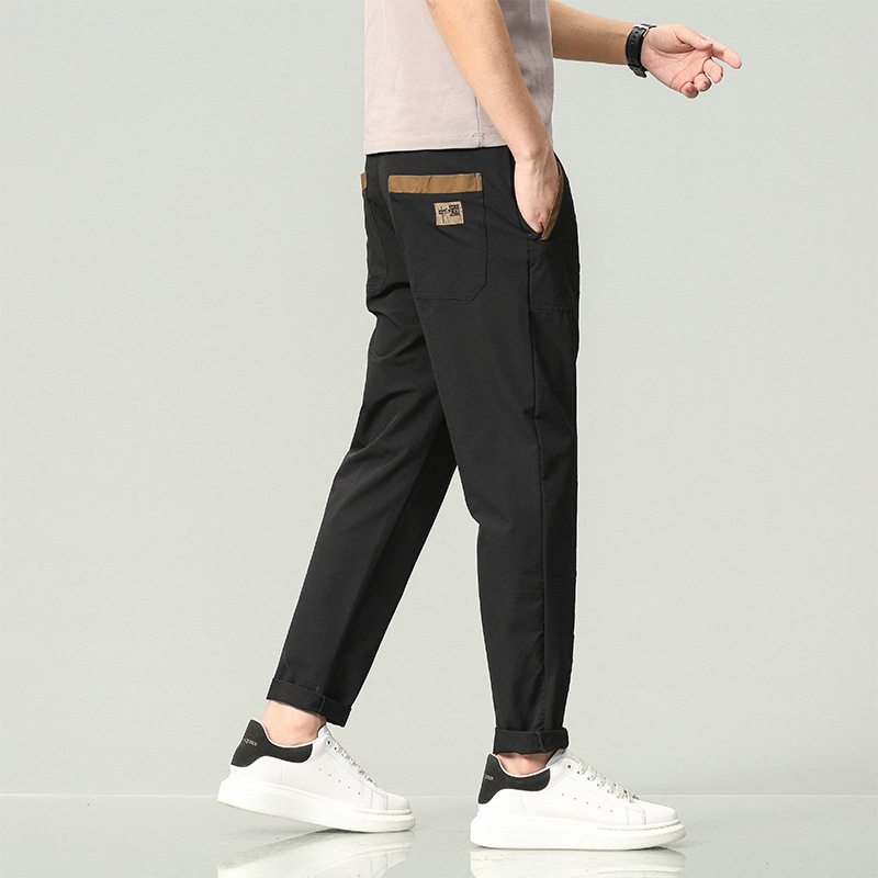 Pantalones casuales de los hombres primavera y otoño nuevo slim fit flaco chino bordado elástico cintura encaje casual jeans ropa