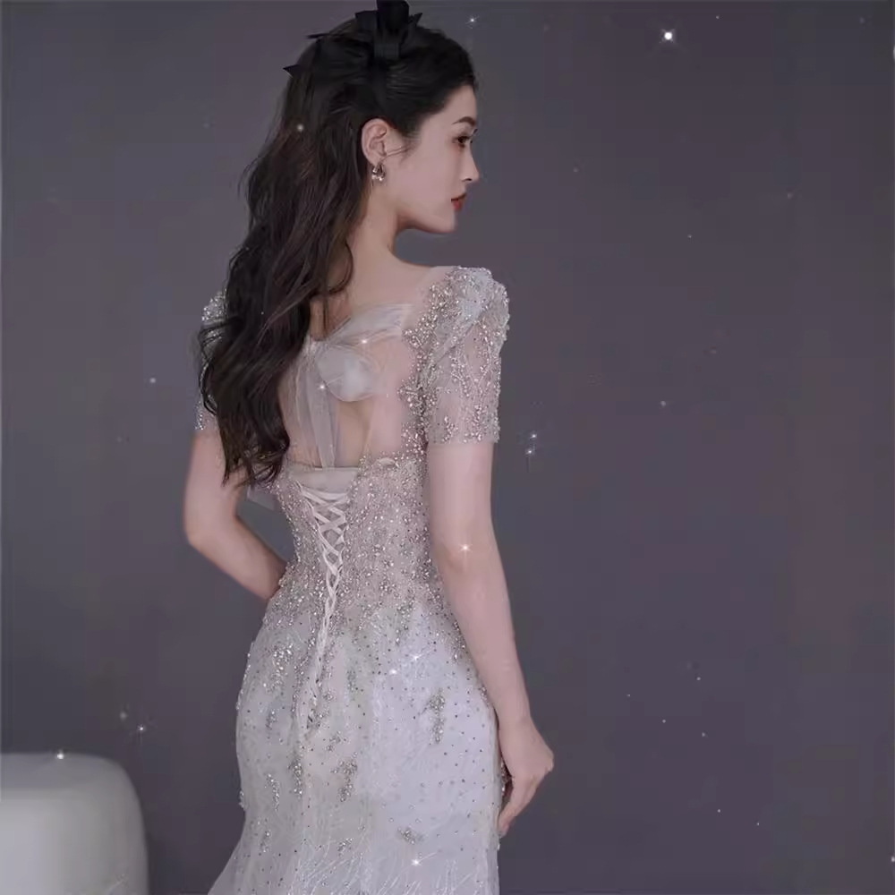 Nuevo vestido de novia estilo sirena francés 2026 con cola para bodas transfronterizas, con una elegancia súper mágica para la novia.