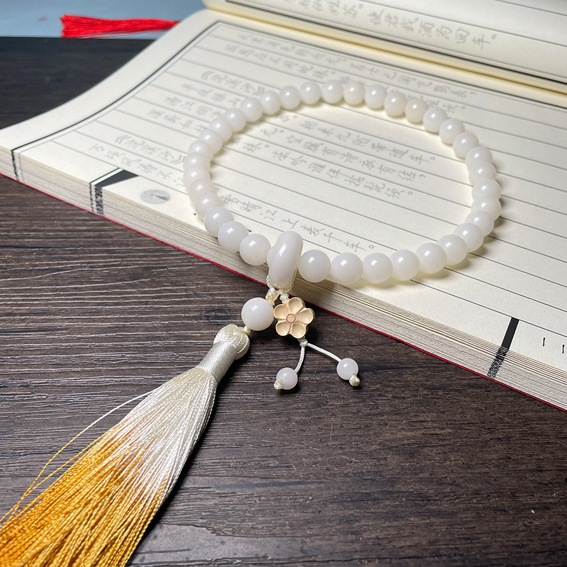 61. 핸드 헬드 화이트 옥 바디 10mm [매화 러닝 링]]