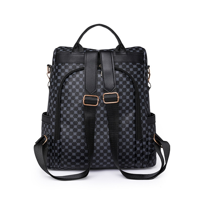 Comercio exterior al por mayor 2023 nueva versión coreana de las señoras de cuero suave mochila antirrobo moda contraste color bolsa de viaje al aire libre de doble uso