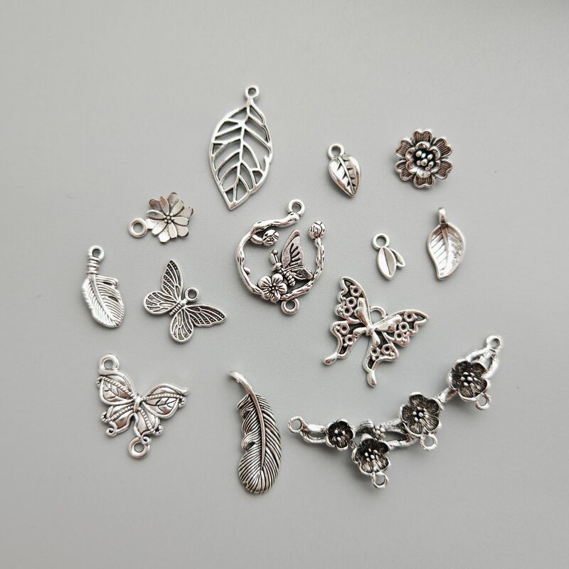 Alloy Xizang Silver Modern Style Leaf Butterfly Feather Peach Blossom Pendant Handmade DIY Bracelet Bracelet Jewelry Accessories Alloy Xizang Silver Modern Style Leaf Butterfly Feather Peach Blossom Pendant Handmade DIY Bracelet Bracelet Jewelry Accessories
