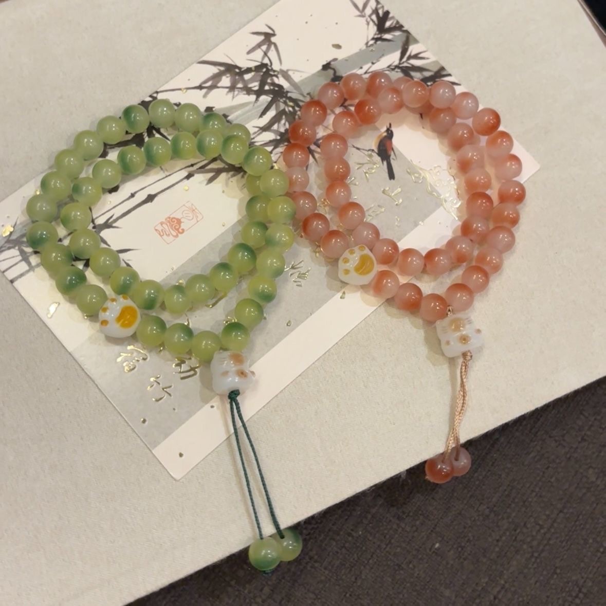Cute garra de gato Bodhi doble anillo pulsera estudiantes alrededor de los dedos suave para jugar pulsera dulce de alto valor facial pareja regalo de amiga