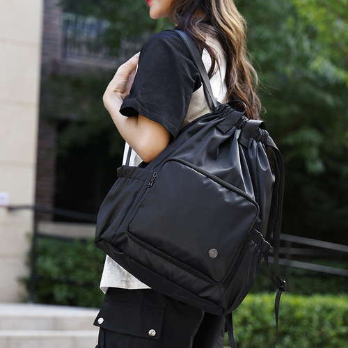 Double-shoulder bag with drawstring pockets, simple and versatile backpack, lightweight for sports, outdoor travel, storage bag, suitable for women, foreign trade.