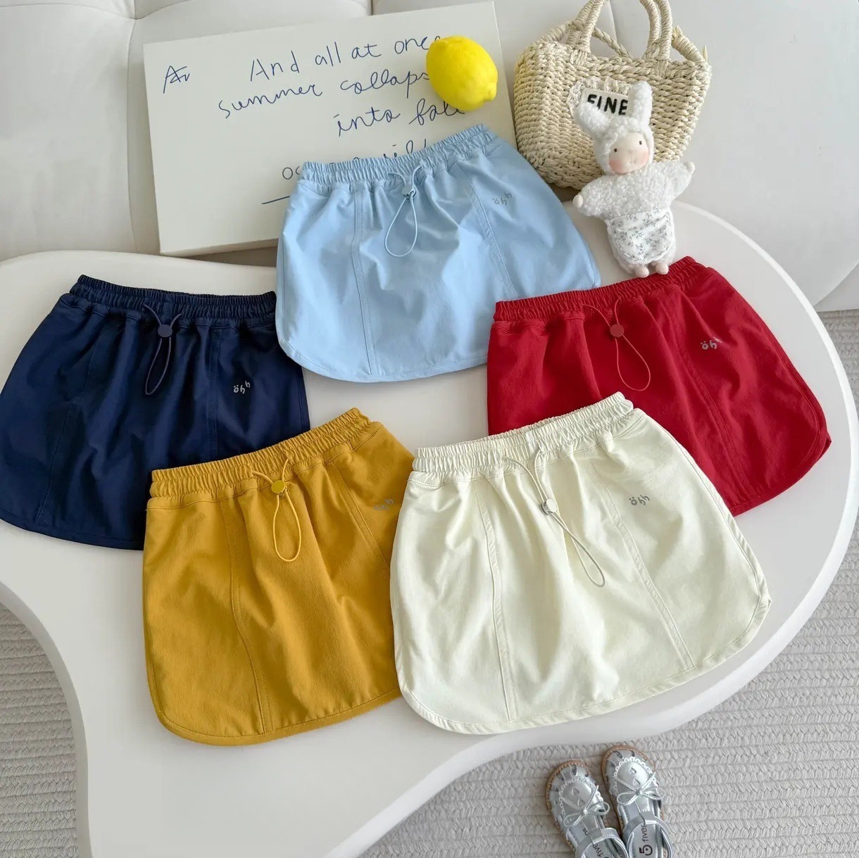 Xianning Seven Summer New Style Girls Casual All-Match Cordón Pantalones cortos de moda del tesoro femenino Falda para niños