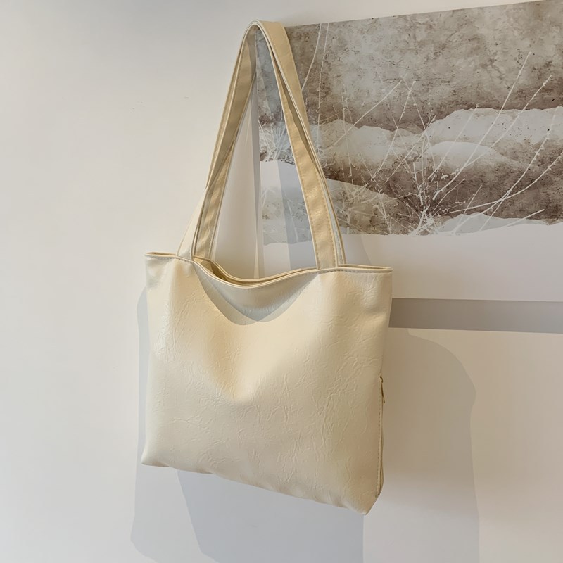 Bagos de vestir vintage de estilo perezoso para mujeres 2024 otoño nuevo paquete de hombro bajo la axila de la pequeña capacidad de la bolsa de hombro de viaje