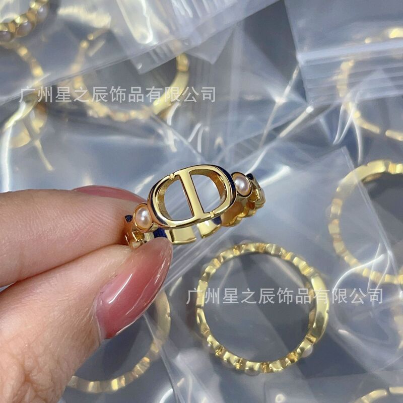 Real Shot of D Brand Letter Cd Pearl Open Ring for Women, Fashionable Pig Nose Ring, Wholesale from Factory Real Shot of D Brand Letter Cd Pearl Open Ring for Women, Fashionable Pig Nose Ring, Wholesale from Factory
