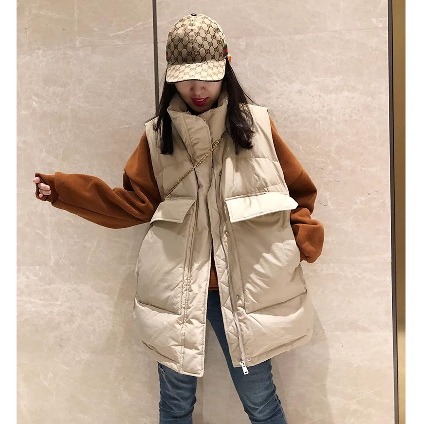 2023 otoño e invierno nuevo estilo coreano más tamaño medio-largo abajo Chaleco de algodón Chaleco de las mujeres chaleco suelto todo fósforo abrigo moda