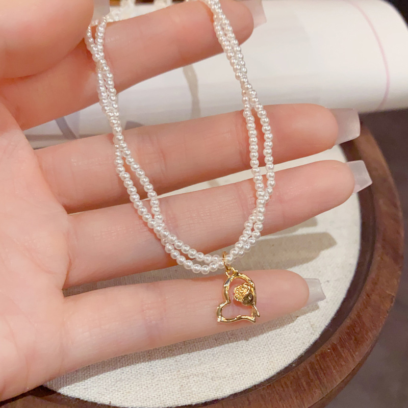 Double-layered Heart Pendant Necklace With Pearls In Gold Finish_voghion.com