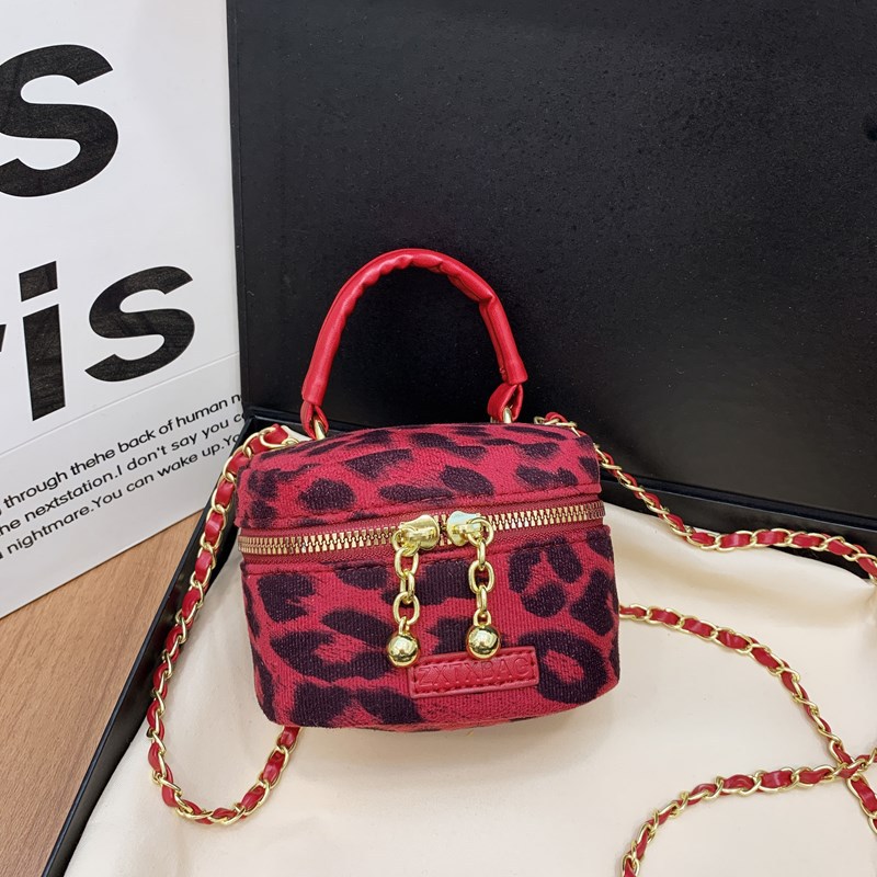 Bolsos para niños de nuevo estilo Bolsos de hombro para niños y niñas con estampado de leopardo de moda coreana Bolsos de mensajero de cadena de bebé con lazo de estilo occidental