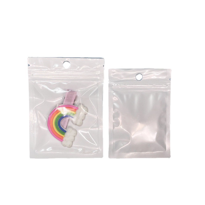 Película de perlas Yin y Yang bolsa autosellante translúcido película de perlas hueso tirando de la bolsa de teléfono móvil bolsa de embalaje de la cáscara equipo de pesca bolsa de sellado de plástico