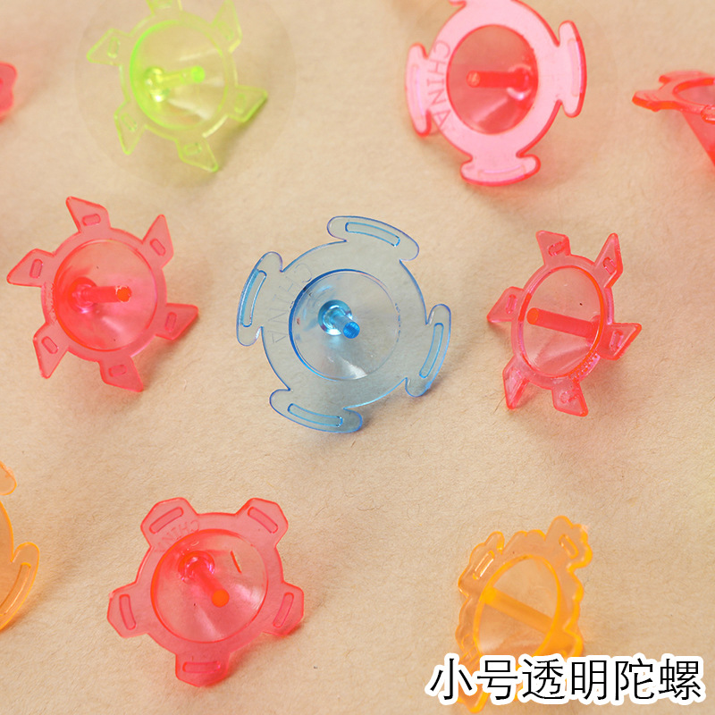 2cm tamaño pequeño transparente pequeño giroscopio transparente giro de la mano giroscopio de plástico pequeño giroscopio de color rotación del suelo jardín de infantes pequeño regalo