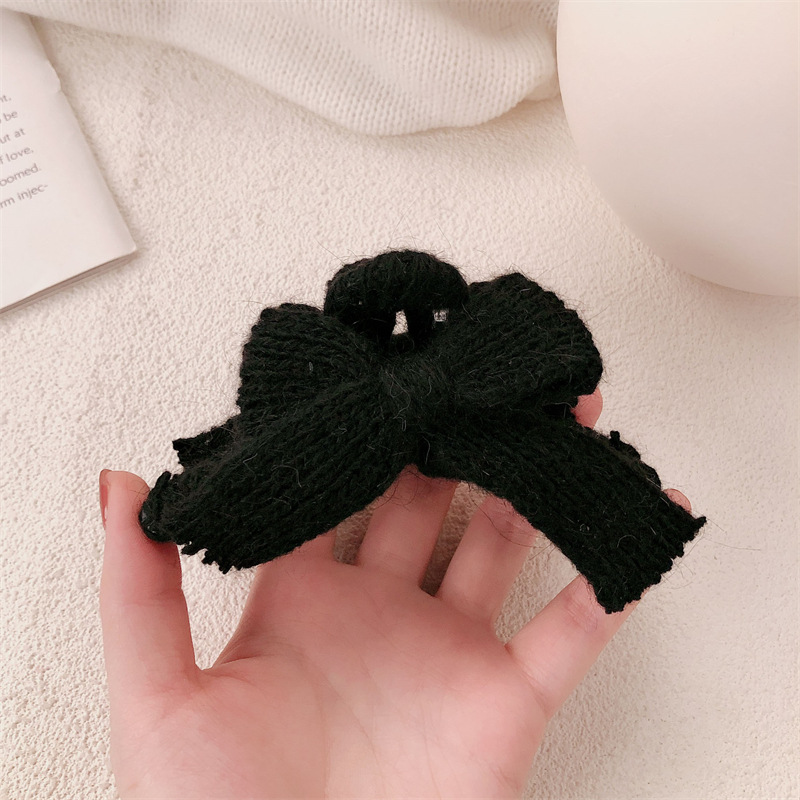 Otoño y invierno nuevo arco lana de punto pinzas de cabello de alta sensación otoño y invierno tocado de Año Nuevo rascar pinzas de pescado para mujeres