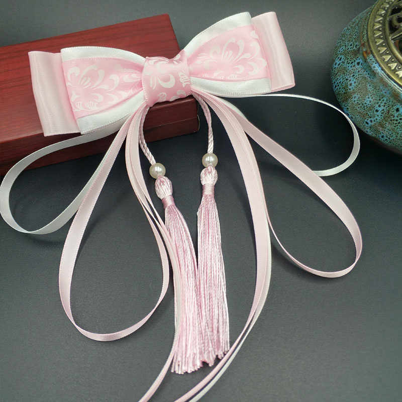 Fuchsia blue and white hairgrip with tassels