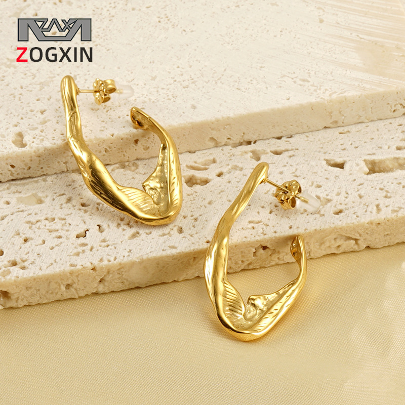 Cruzar la frontera europea y americana de acero de titanio irregular pendientes hembra 18K de acero inoxidable de moda nicho de diseño pendientes al por mayor