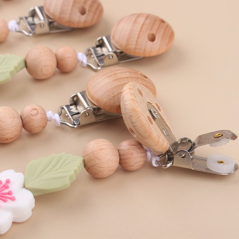Nuevo clip de chupete de haya para bebés, dibujos animados creativos para bebés, flor de begonia, muerde los dientes, cadena de chupete anti-caída
