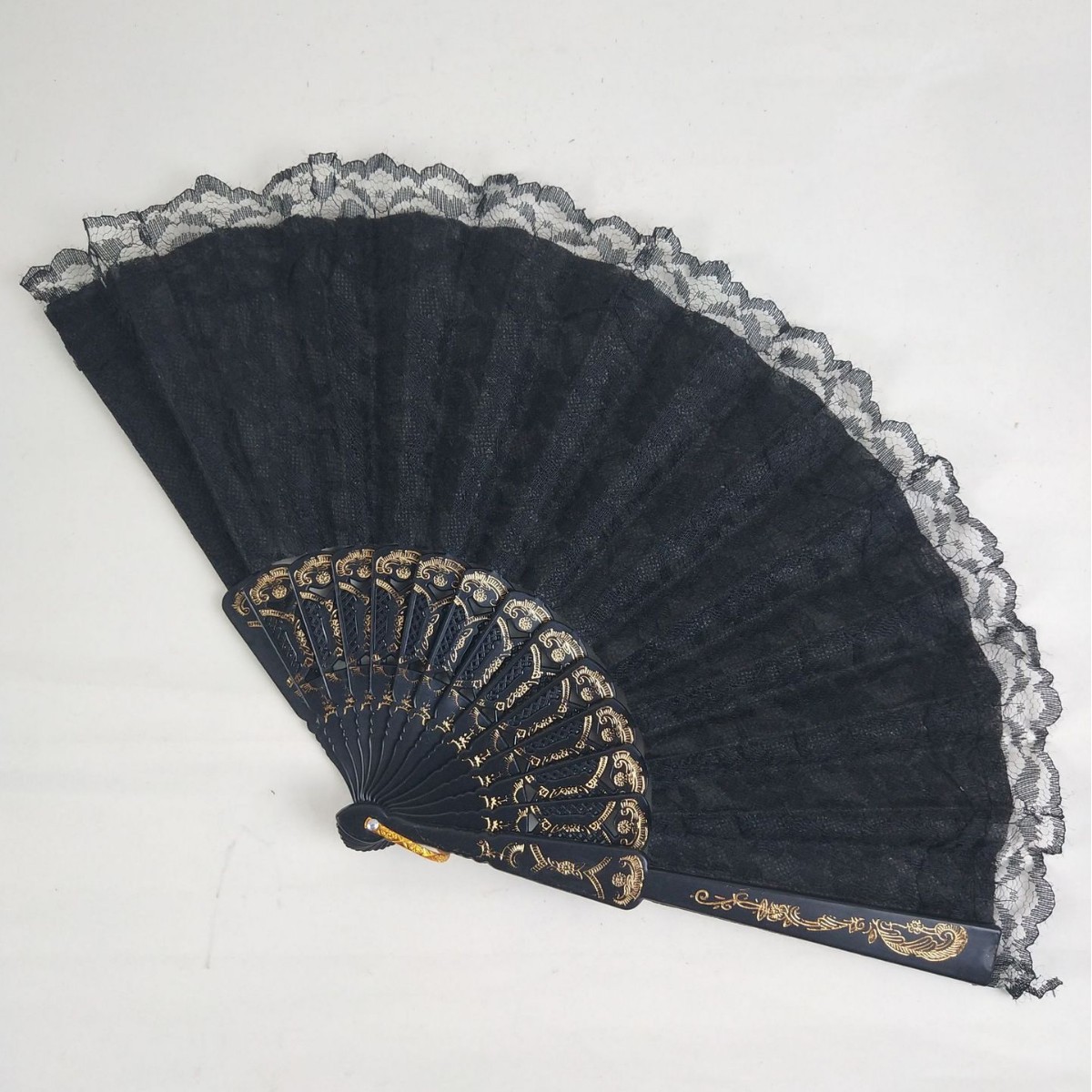 Hay en stock piezas de plástico hueso ventilador plegable de encaje estilo gitano ventilador de encaje transfronterizo