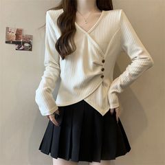 大きいサイズの厚い穴の条の不規則な型の底のシャツの女性の秋冬の新型のゆったりしているのが見えて痩せていて暖かい長袖の上着の女性です。