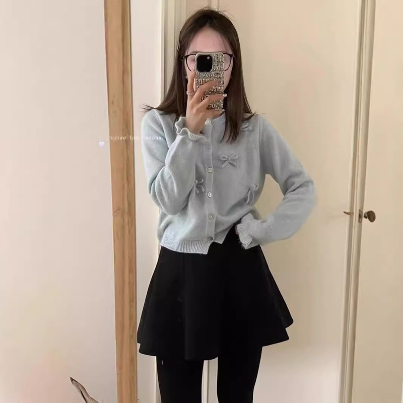 蝶結びの洋風の韓国版のニットのカーディガンのセーターの春と秋の新型の女性の上着の外は大衆のデザイン感の丸首を着ます。|undefined
