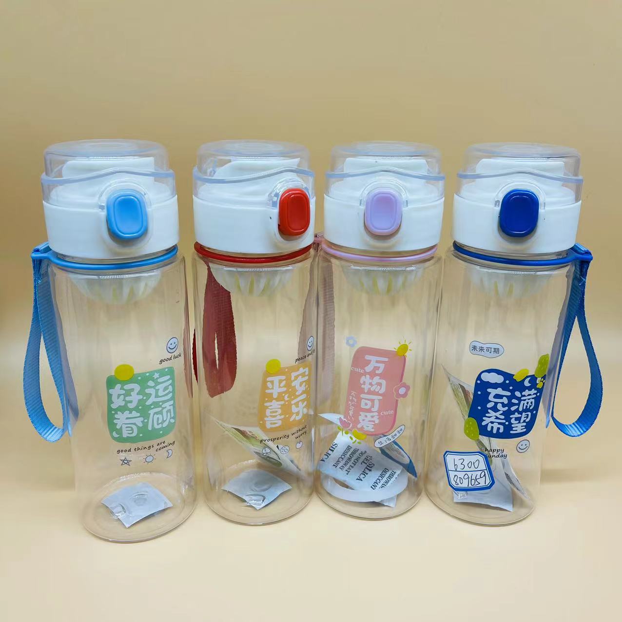 Cubierta de rebote estudiante pequeña capacidad deportes portátil 600ml té perfumado taza portátil rebote taza de agua de plástico con mango