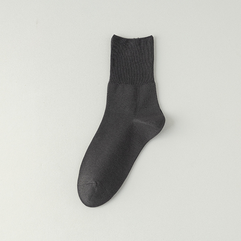Calcetines de algodón de color sólido para hombres primavera, otoño y invierno en una máquina sin costura de hueso anti-balling embalaje independiente de calcetines de algodón