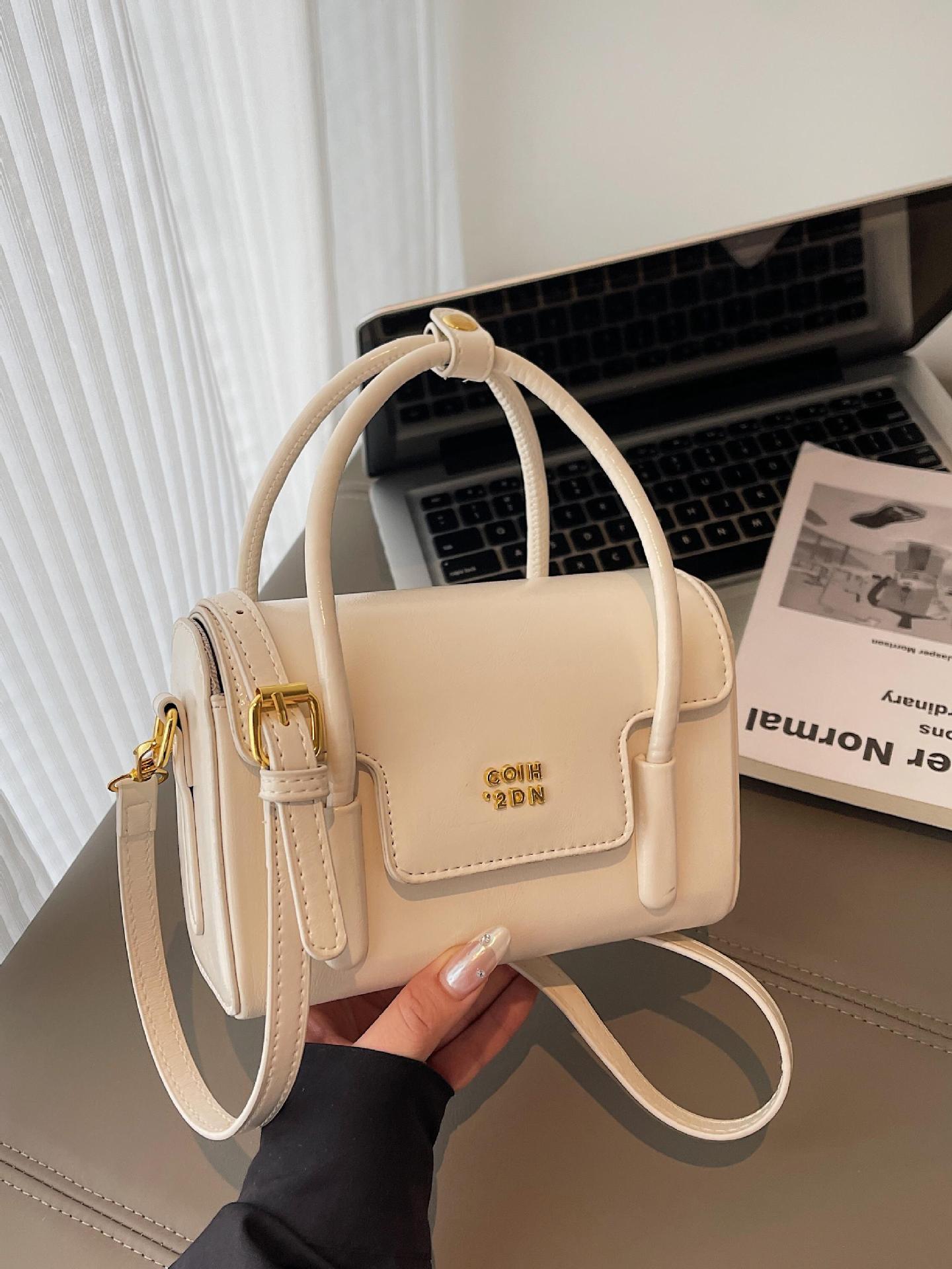 Bolso cuadrado pequeño de mano de tendencia retro coreana 2025 nuevo bolso de hombro de moda salvaje popular bolso de mensajero de alta gama