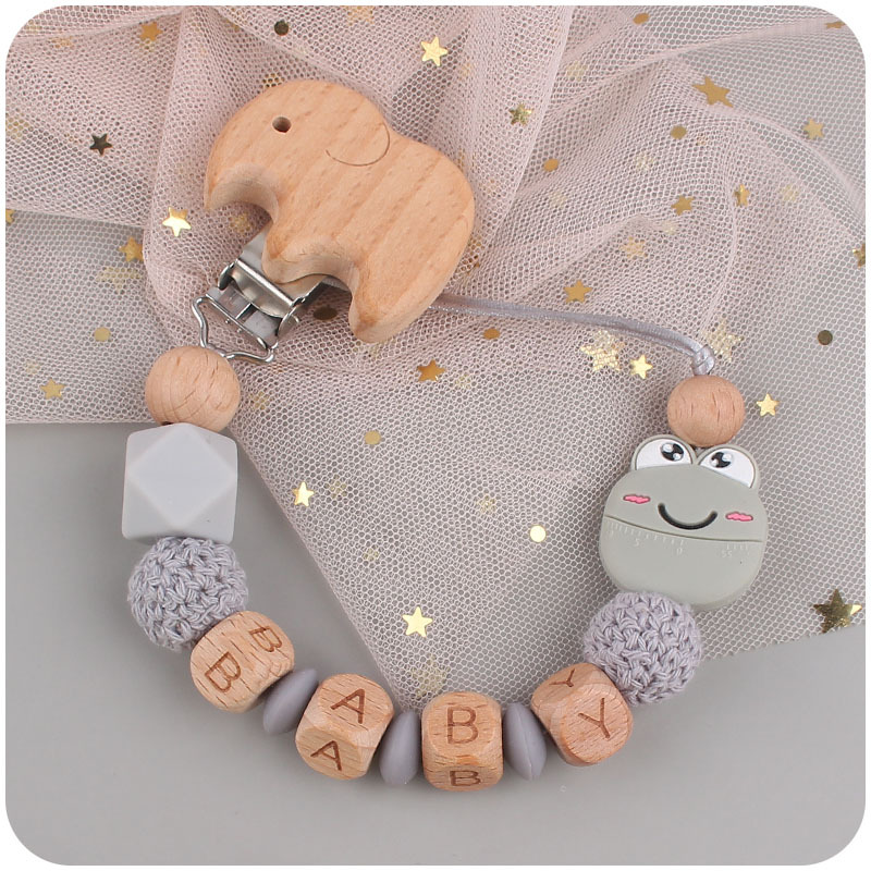 Suministros para bebés dibujos animados animal Rana pájaro mordedor chupete cadena calmante bebé mordedura molar cadena anti-caída