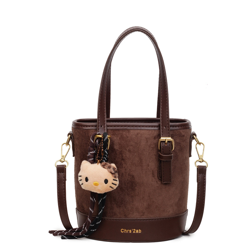 Cross-border coreano nicho esmerizado bolso de cubo de mano mujer 2025 nuevo invierno retro mochila de hombro mochila de viaje