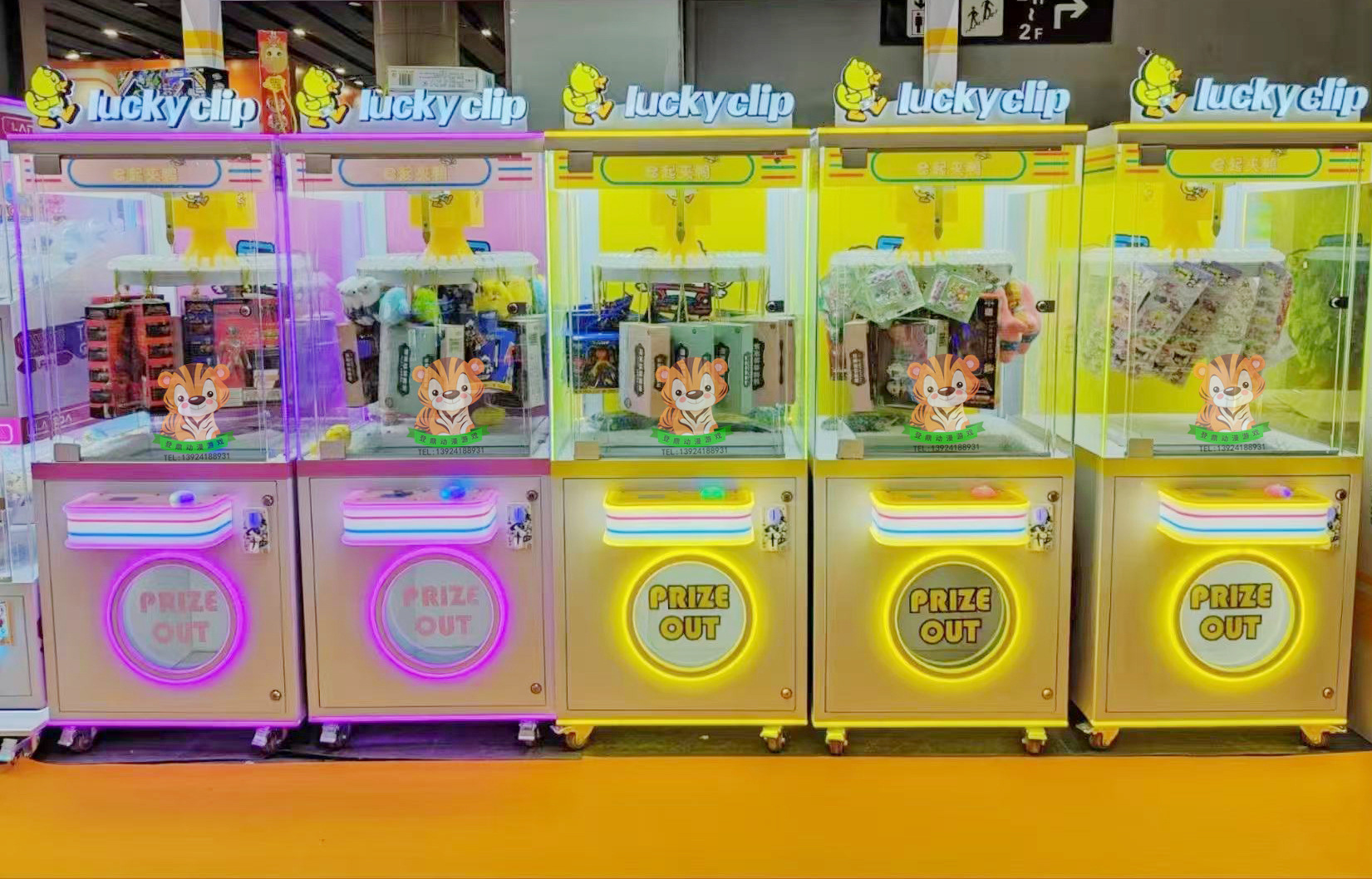 El nuevo fabricante de la fuente de la máquina de clip utiliza monedas para mayoristas, pegatinas para niños, clips para bocadillos, máquina de regalo, máquina de garras