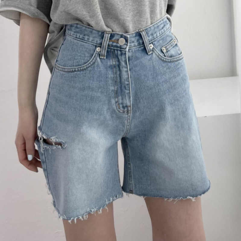 High-Waisted Washed Denim Pants with Side Slit on One Leg and Wide Legs for a Slimming Effect