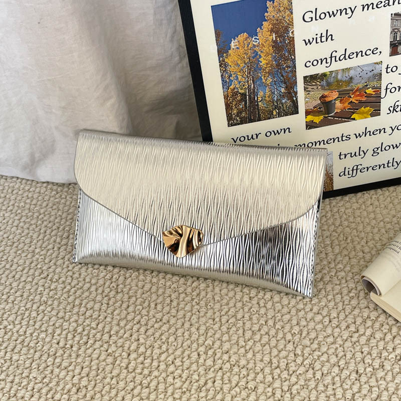 Casual simple estilo exterior de moda sobre de mano bolsas de mujer verano 2026 nuevo nicho coreano diseño textura de viaje