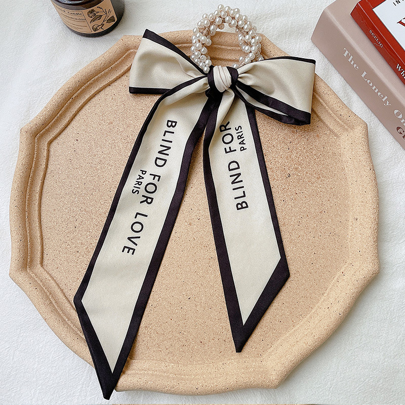 Banda de pelo de bufanda de seda para mujer corbata de pelo fino de verano de perlas cinta de arco Hada cuerda de pelo de todo fósforo estilo coreano accesorios para el cabello al por mayor