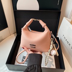 ハンドバッグの女性のタイプ2025の新型の夏の流行のショルダーバッグの小さい大衆の設計の百合の斜めなショルダーバッグの女性の小さい包み