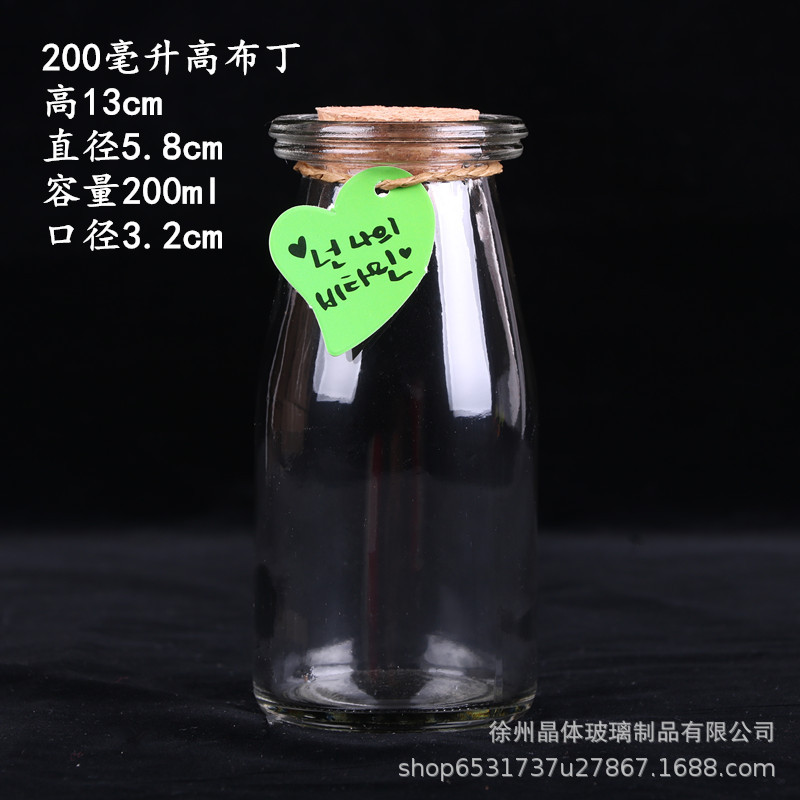 卸売り100mlガラス布丁瓶厚手牛乳カップ耐高温ヨーグルト瓶木栓ガラス瓶許瓶瓶