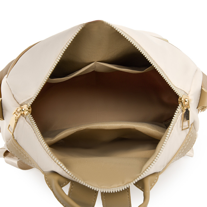 Mochila de tela Oxford nueva transfronteriza para mujer Mochila de moda estilo coreano retro mochila de viaje de moda con remaches simples