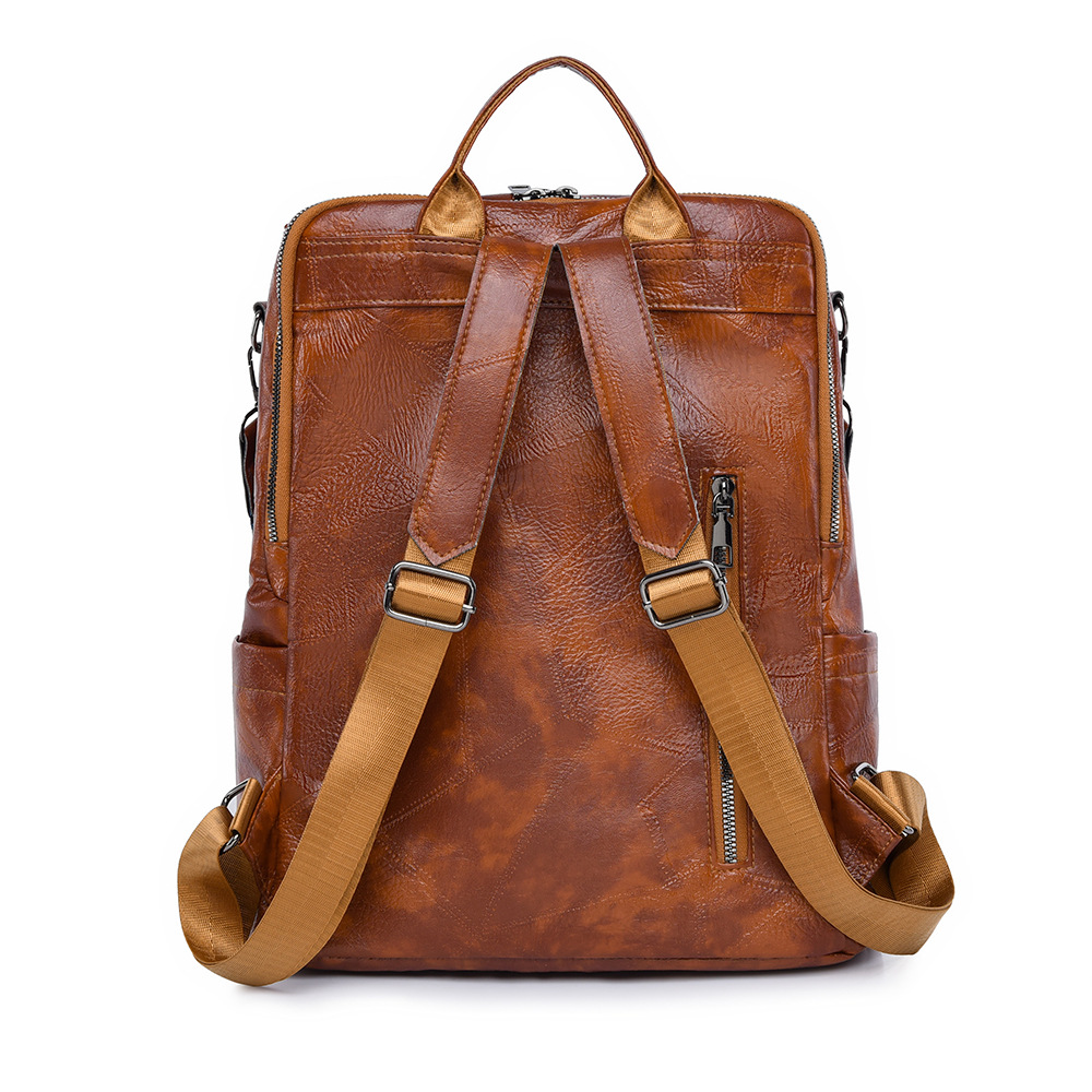 Mochila de cuero suave para mujer retro casual de nuevo estilo transfronterizo, mochila de hombro de gran capacidad simple y versátil al por mayor