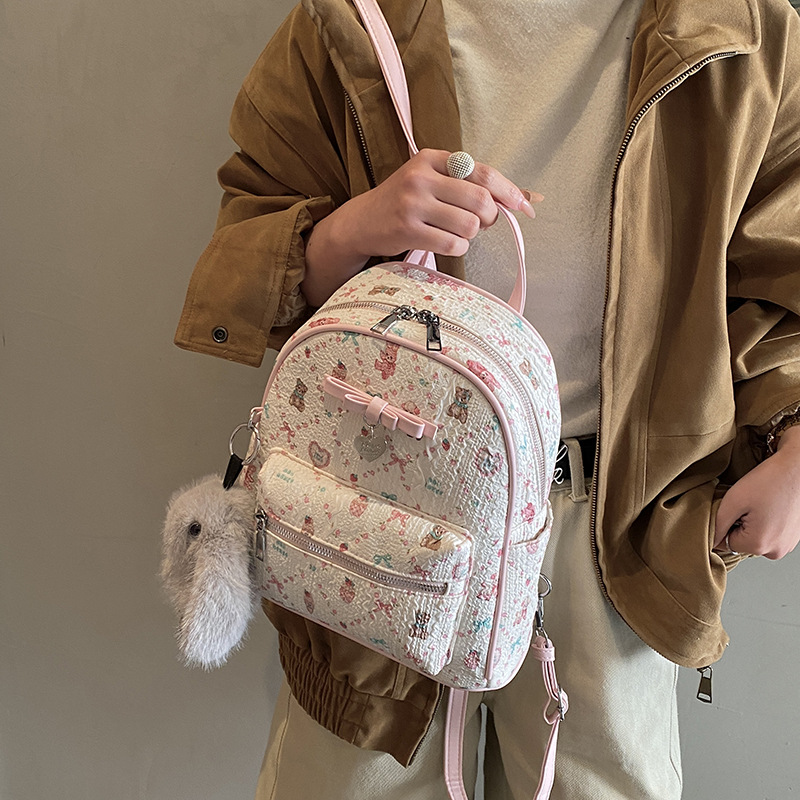 甜美少女可爱双肩背包包女2025新款通勤大容量背包学生卡通印花包