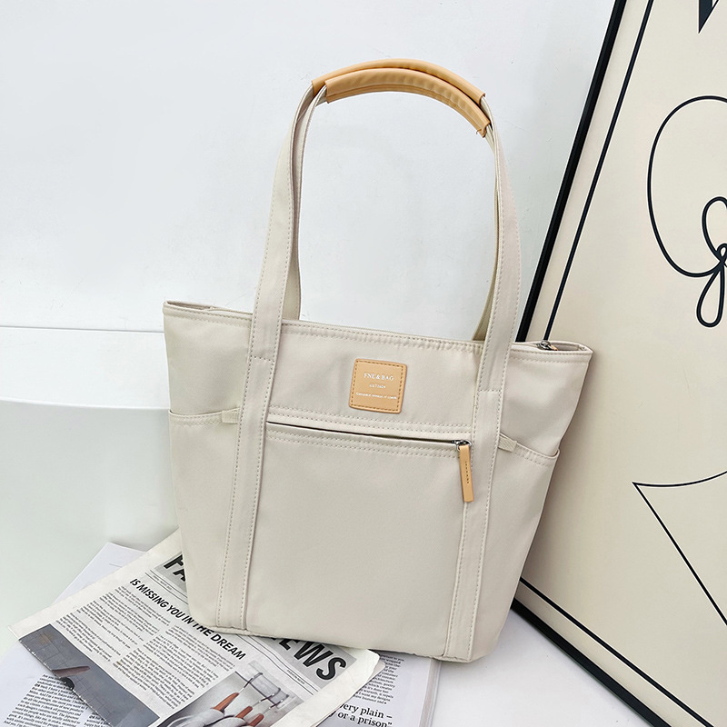 Bolso de mano simple de un solo hombro de gran capacidad en vivo Bolso diagonal de moda casual para mujer 2024