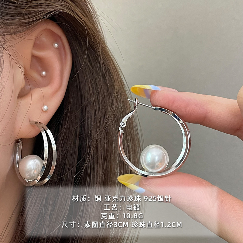 2025 nuevo estilo verano de moda anillo plateado círculo negro círculo fino temperamento europeo y americano aretes dorados de todo fósforo